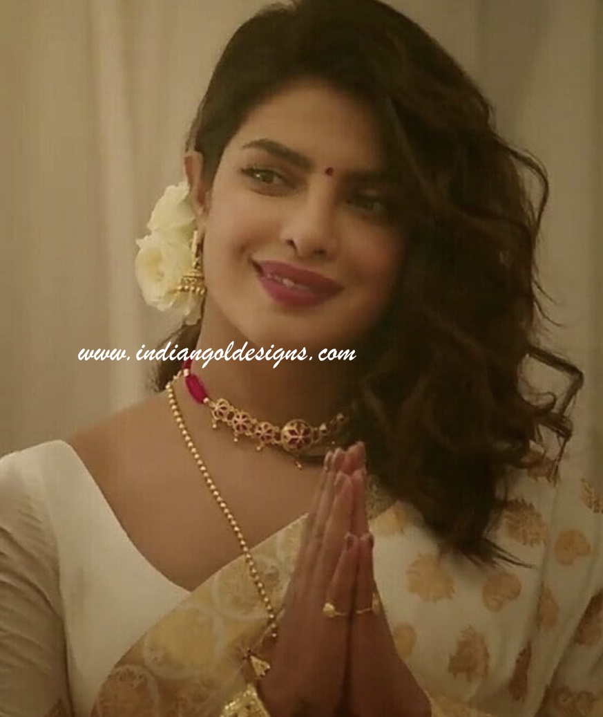 Gold and Diamond jewellery designs Priyanka Chopra in gold jewelry
