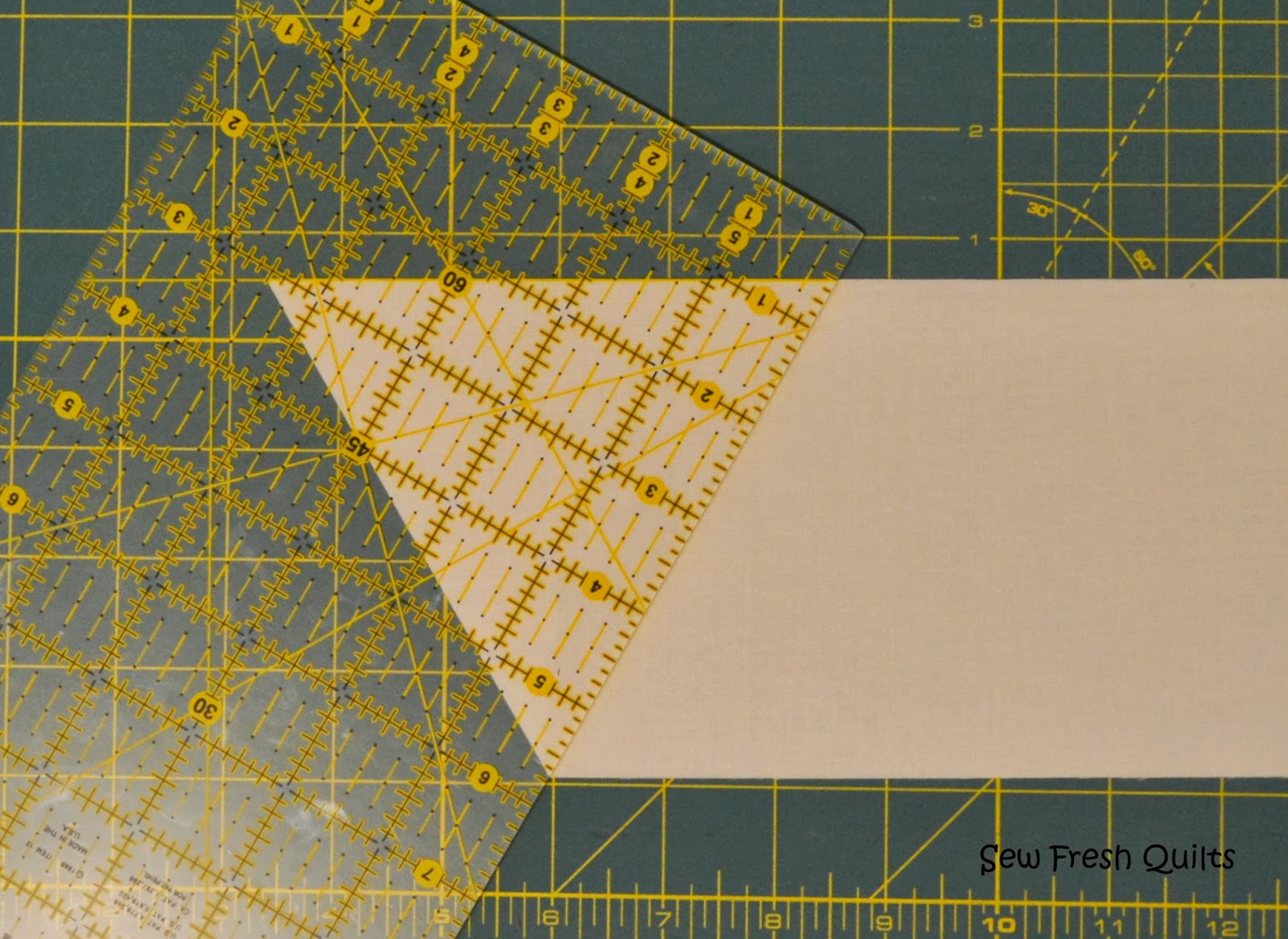 How to use your quilting ruler to cut 60 degree triangles 