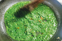 Cooking spinach (Palak) paste for palak paneer recipe