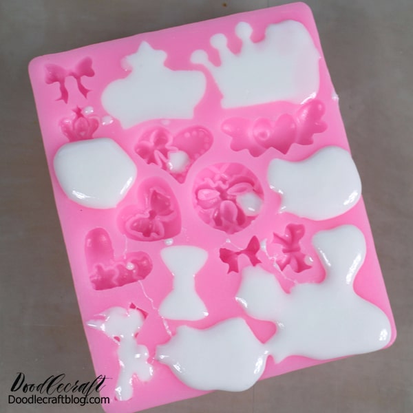 Pour the newly mixed resin into the silicone mold. It’s okay if it’s a little messy, it can be cleaned up. Then let the resin set for 15 minutes.