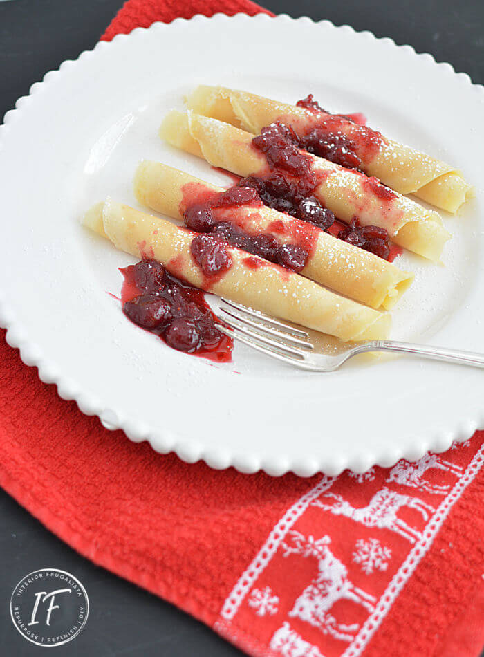 These make-ahead festive eggnog crepes with cranberry grand marnier compote are an excellent Christmas morning breakfast or holiday brunch recipe idea.