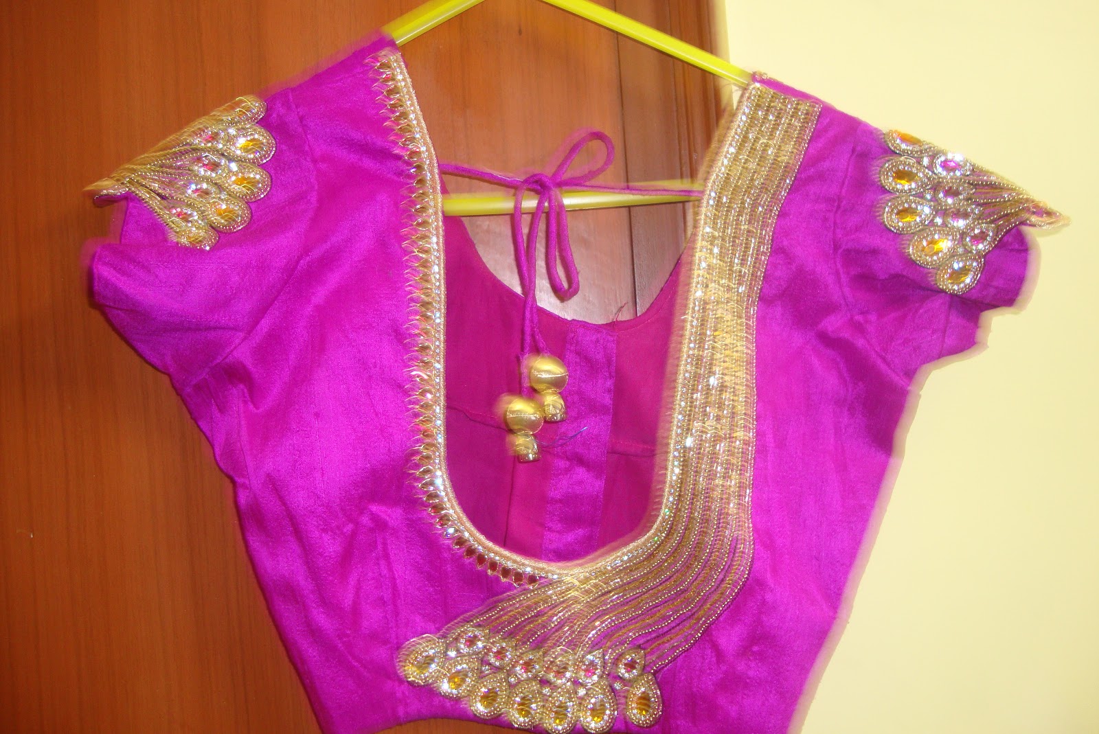 Lakshmi boutique hand embroidery maggam work blouse back neck