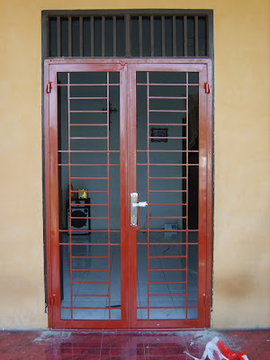 pintu besi rumah