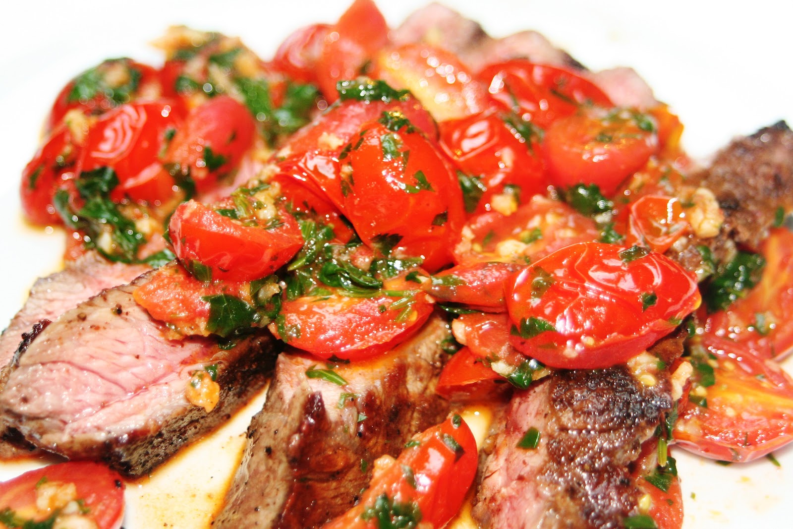 Cooking in Kirkland Steak with Tomato and Cilantro Sauce