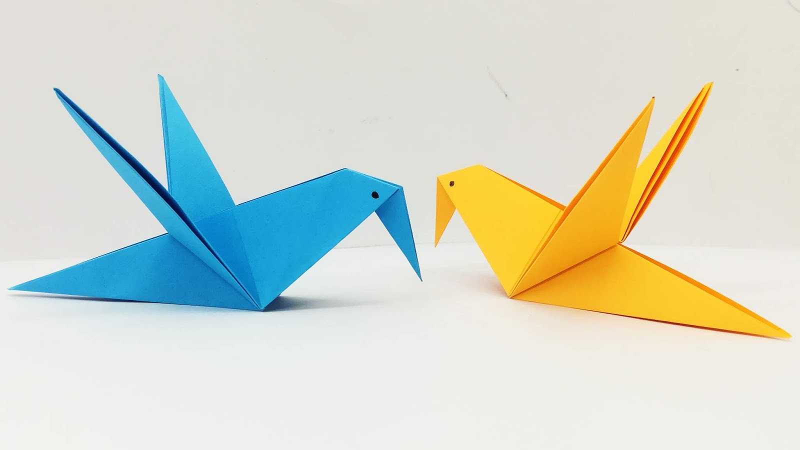 Легкая птичка из бумаги. Оригами. Оригами птица. Техника оригами птица. Бумажная птица оригами.