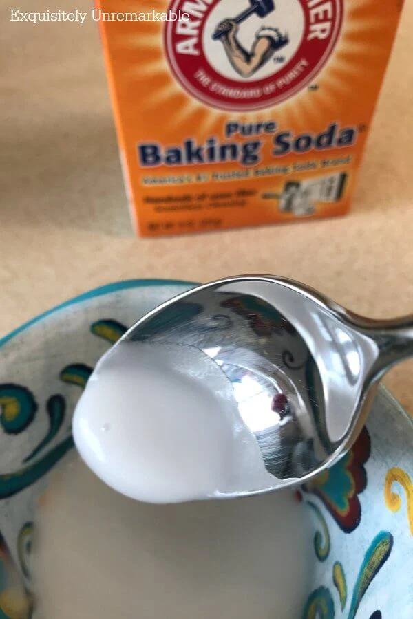 Baking Soda Water Paste For Cleaning on a spoon