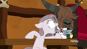 A still grayed out Pinkie yelling at waiter yak as he clears away ice cream dishes.