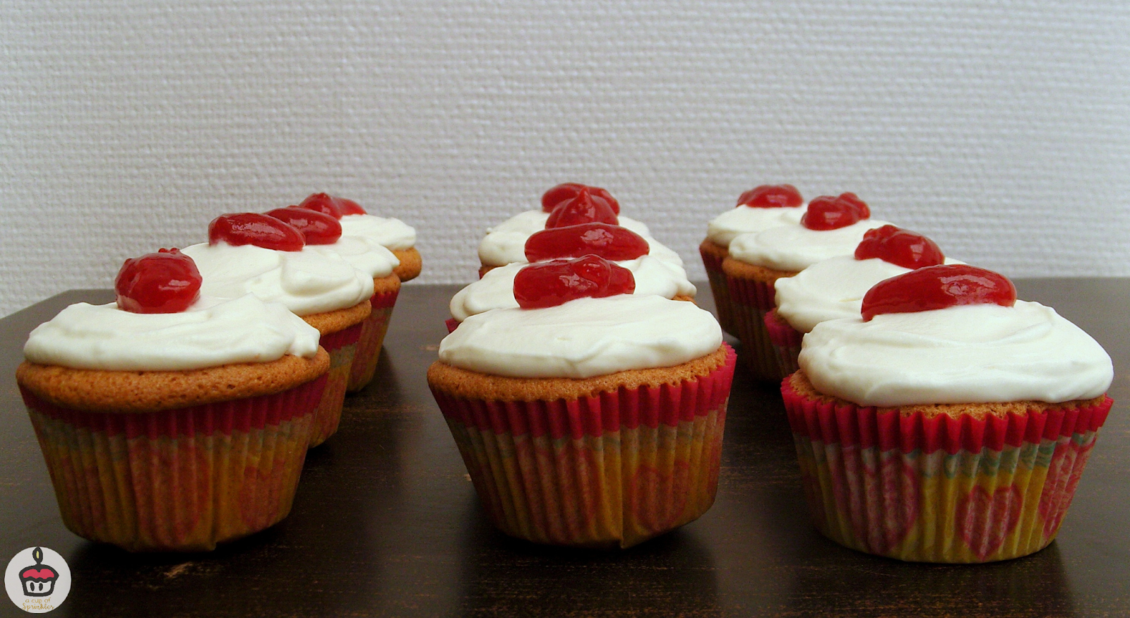 Raspberry Mascarpone Cupcakes These vanilla cupcakes have a delicous raspberry filling and a light and fluffy mascarpone frosting.