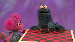Abby Cadabby and Cookie Monster want to play checkers. Cookie Monster eats checkers. Sesame Street Episode 4416 Baby Bear's New Sitter season 44