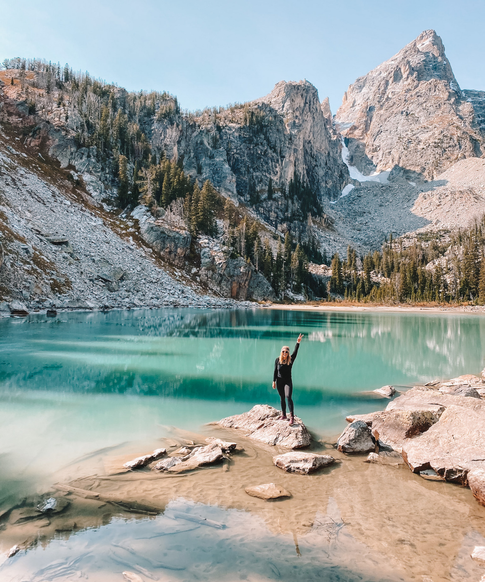 Amanda Martin of OKC based travel blog Amanda's OK hikes to Delta Lake in Grand Teton National Park