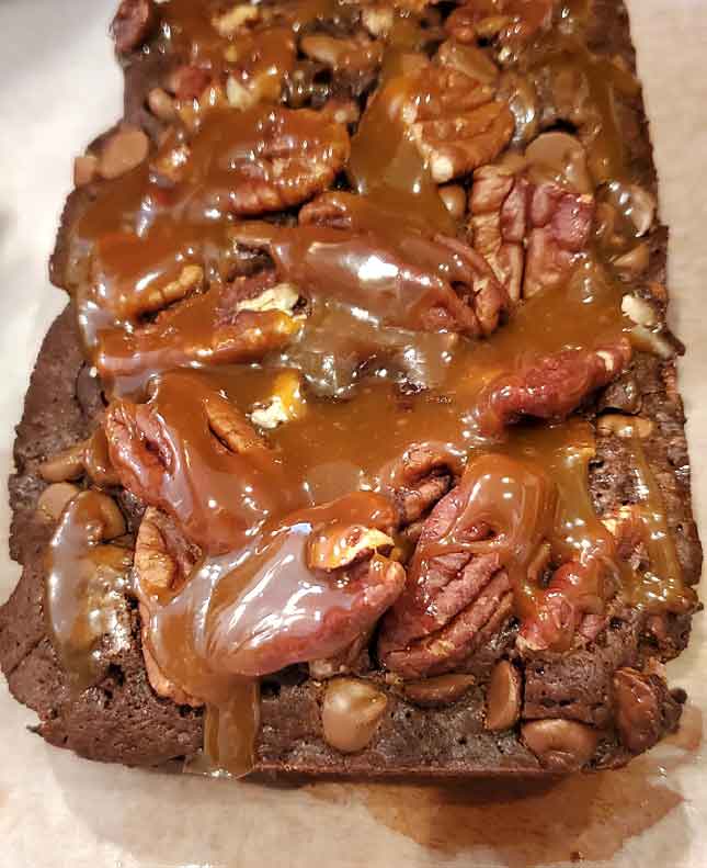the is a pan of chocolate cake turned into turtle brownies