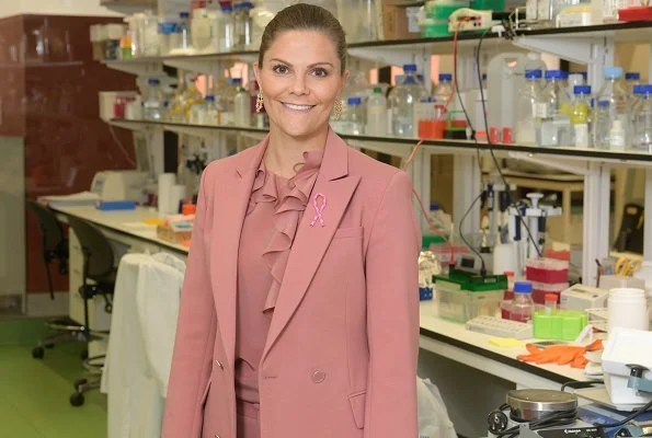 Crown Princess Victoria wore Rodebjer Nera pink blazer and Rodebjer Xilla silk blouse at Karolinska University Hospital