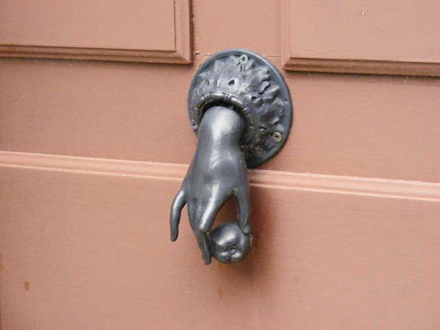 So-called 'Hand of Fatima' door knocker. Indre et Loire, France. Photographed by Susan Walter. Tour the Loire Valley with a classic car and a private guide.