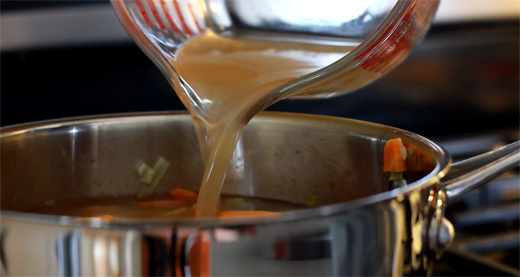 Pouring Broth into Pot to Make Extra Good Butternut Squash Soup!