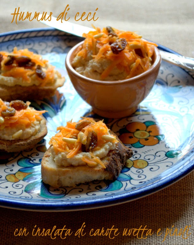 hummus di ceci con insalata di carote, uvetta e pinoli