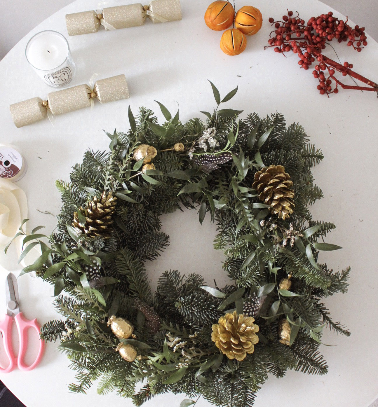 decorating a christmas wreath