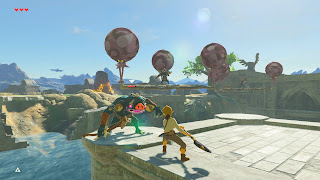 Link fighting a blue Bokoblin on the Great Plateau with a floating platform in the background