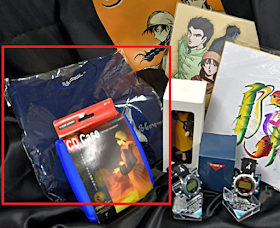 Shenmue Logo on Blue Shirt (From Kickstarter Rewards image, at left)