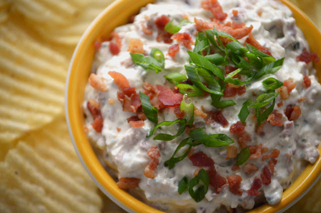 With college and professional football season just days away from its official start, these chip dips are a necessity for hosting a football season kickoff party, or to have nothing between you and your sweet, glorious, high-def TV filled with amazing football games except these delicious, comfort dips. These quick, easy, and delicious chip and dip recipes will complete the tailgate experience you have been imagining since our last glimpse of football in February. 