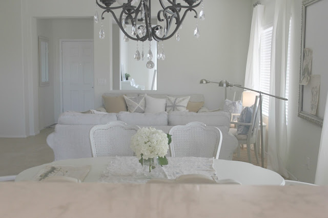 Serene neutral living and dining room decor DIY makeover on Hello Lovely Studio