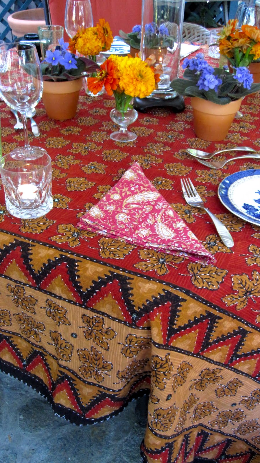 Joe Ruggiero Designer/ HGTV Host Indian Themed Dinner With Bright Table Setting.