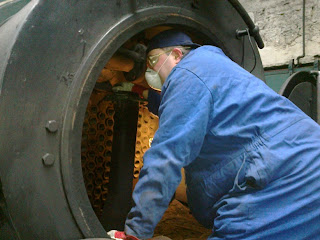 Tommy cleaning No.6's smokebox prior to its boiler inspection