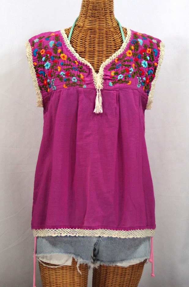 http://www.sirensirensiren.com/shop/new!-embroidered-peasant-tops/marbrisa-sleeveless-peasant-blouse/embroidered-sleeveless-mexican-blouse-marbrisa-fuchsia