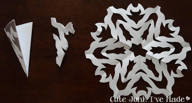 Paper Snowflake Curtain Tutorial - Template 2 folded, cut out and final product
