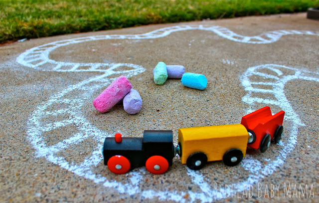 Go beyond the rails with a little sidewalk chalk.  Draw a road, a track, a village. Sky's the limit!