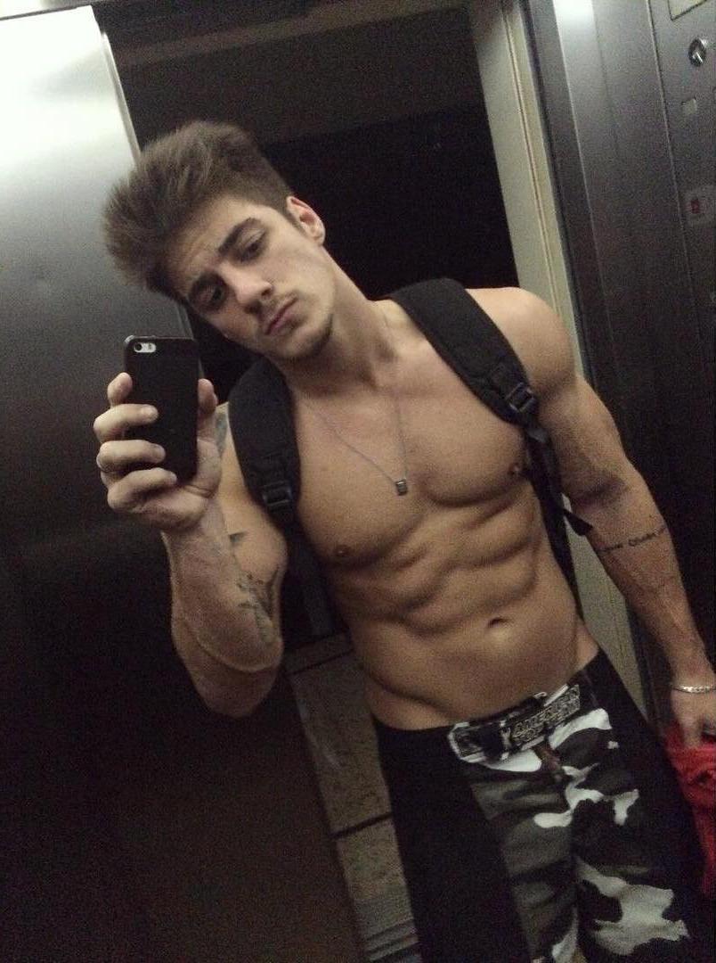 handsome-bare-chest-brazilian-tattoo-hunk-elevator-selfie