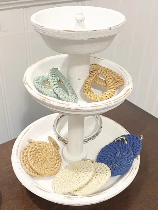 tiered tray filled with earrings