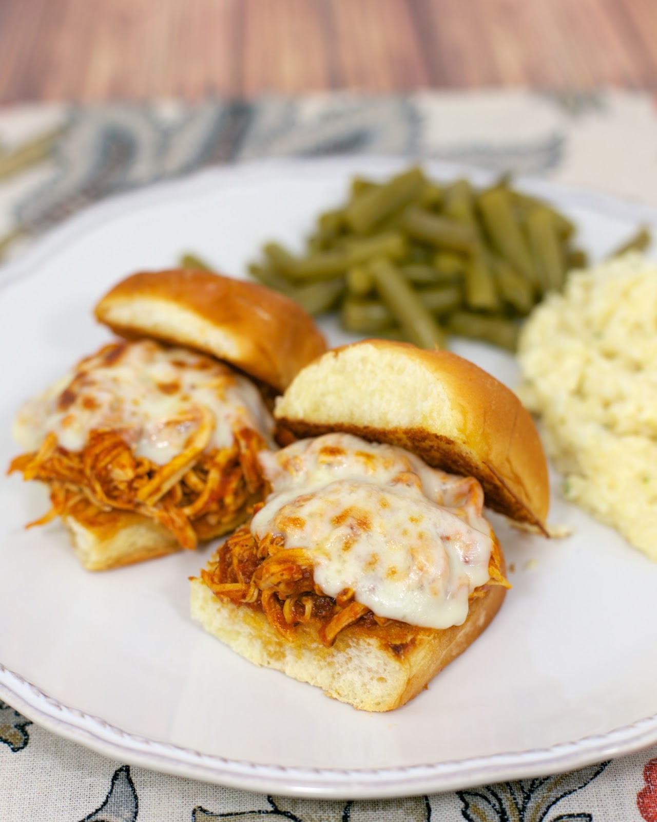 Slow Cooker Chicken Parmesan Sliders - only 3 ingredients for the chicken! Chicken, spaghetti sauce, garlic, mozzarella cheese and buns. Great for an easy weeknight meal or tailgating. Everyone cleaned their plate!! Slow Cooker Chicken Parmesan Sliders - only 3 ingredients for the chicken! Chicken, spaghetti sauce, garlic, mozzarella cheese and buns. Great for an easy weeknight meal or tailgating. Everyone cleaned their plate!!