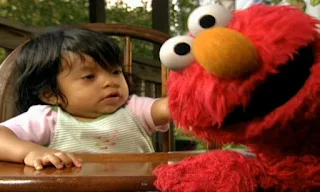 Elmo and a baby show how to wink. Elmo's World Eyes Kids and Baby.