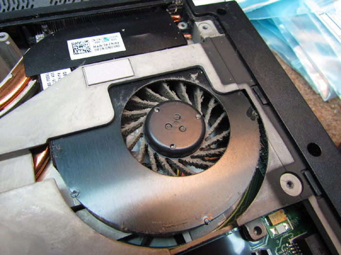 Cleaning Dell Laptop Fan for Improved Performance Crawls Backward (When