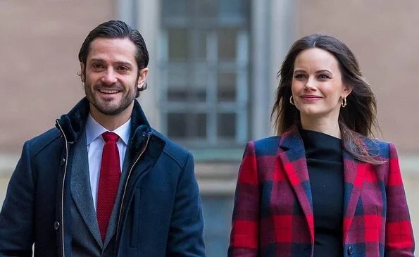 Princess Sofia wore a new plaid wool coat from Tommy Hilfiger, and a black arcelia dress from Dagmar, and leather boots from Zara. Gold earrings