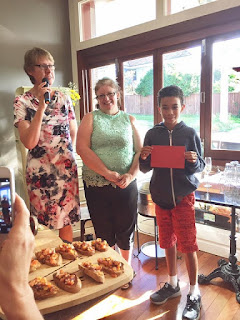 Quota members and Kein Kein receiving a donation from Quota carindale to assist with his work