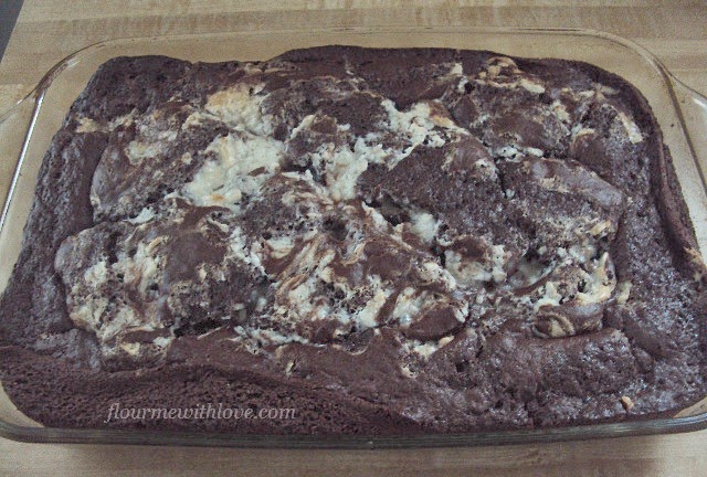 Chocolate fudge, cream cheese, coconut and chocolate chips blended into one delicious cake!