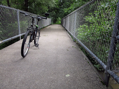 Bike on bridge.