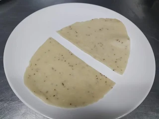 Samosa pastry cut into half for samosa recipe