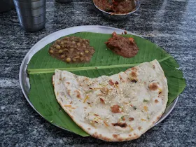 The group having lunch after the long hot ride down the hill