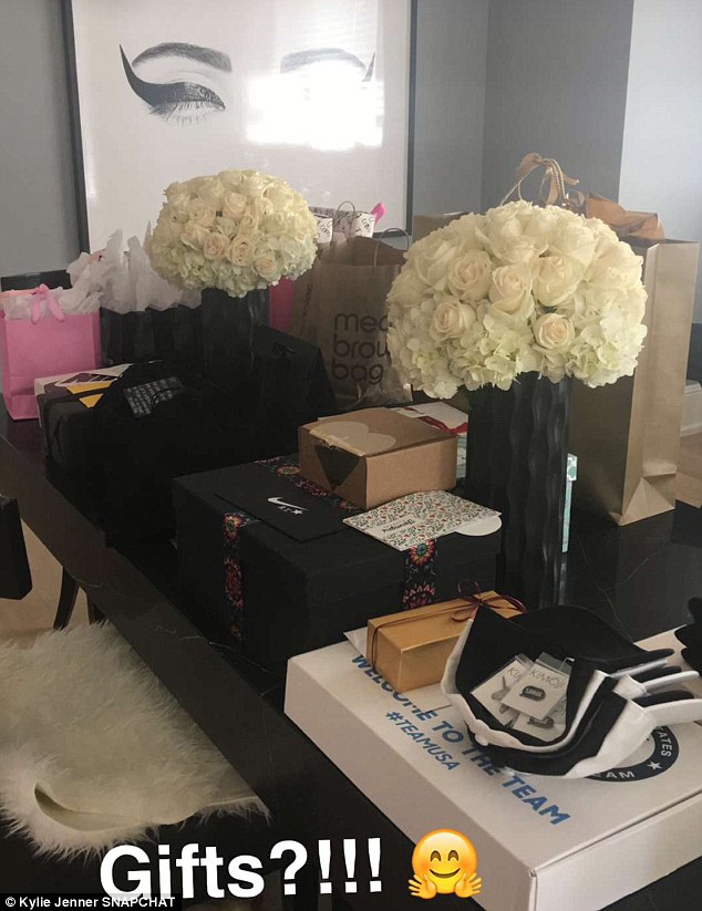Kylie Jenner returns home from birthday holiday with Tyga to gifts from