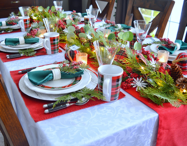 Dining Delight: Cozy Plaid Christmas Tablescape with Garland Centerpiece