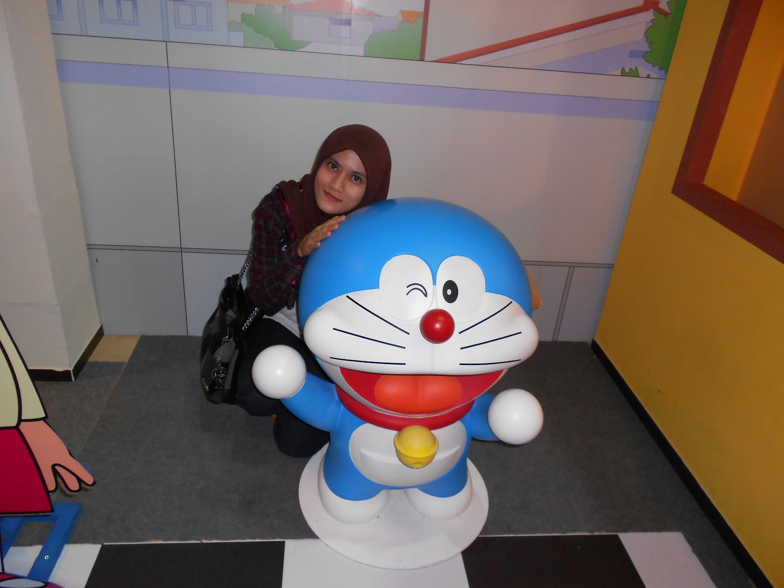 doraemon dengan mainan