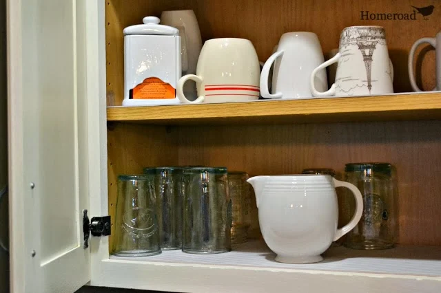 cabinet with mugs and glasses