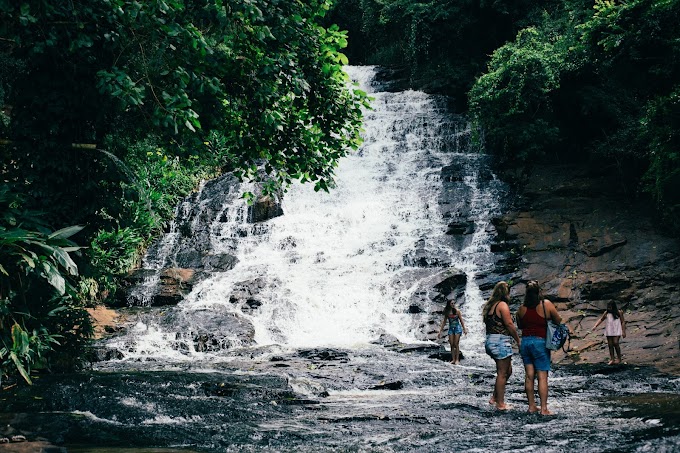 Waterfall behind the women