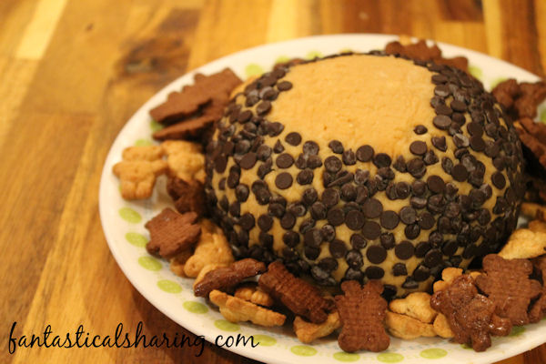 Buckeye Cheeseball // This treat is especially perfect for Ohio State fans on game day! But you don't have to be a born and bred Buckeye to enjoy this sweet pb and chocolate appetizer! #recipe #appetizer #gameday #buckeye #cheeseball #ohio