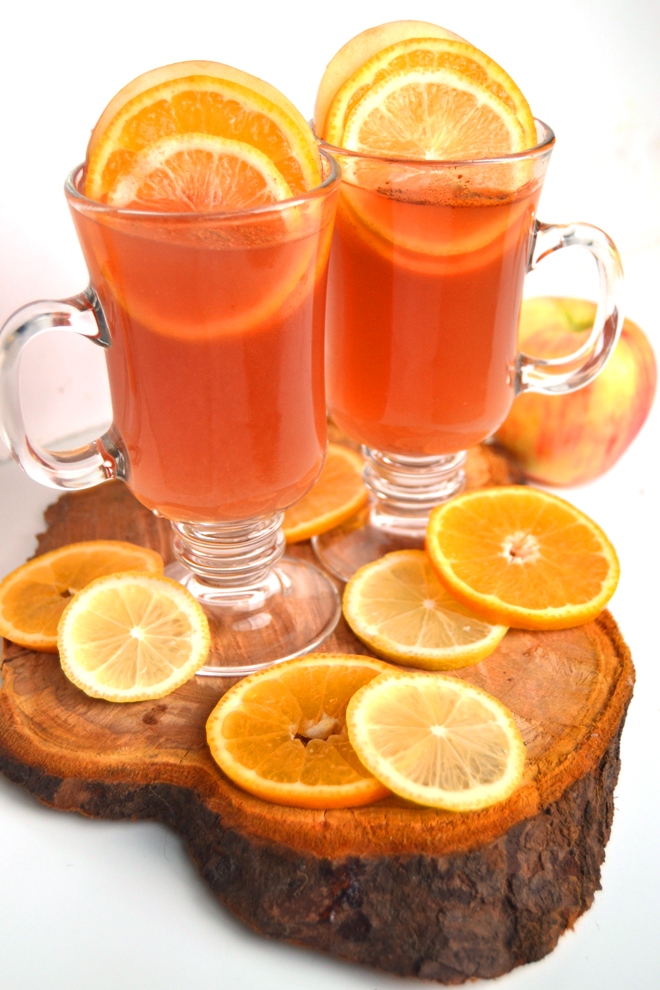 Cranberry, Lemon and Orange Cider is the perfect non-alcoholic beverage for the holidays that is best served hot but is delicious cold as well! A mix of cranberry, lemon and orange juice with cinnamon and fresh fruit. www.nutritionistreviews.com