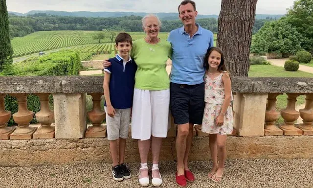 Princess Athena wore a floral print dress from Carrement Beau. Queen Margrethe, Prince Joachim, Prince Henrik and Princess Athena