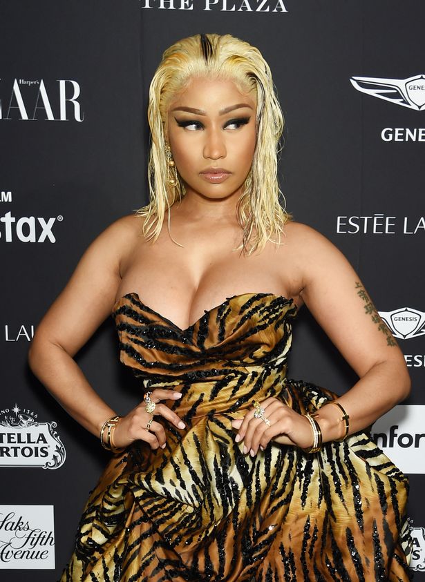 cardi b throws shoe at nicki minaj at the harper 39 s bazaar form to receive money