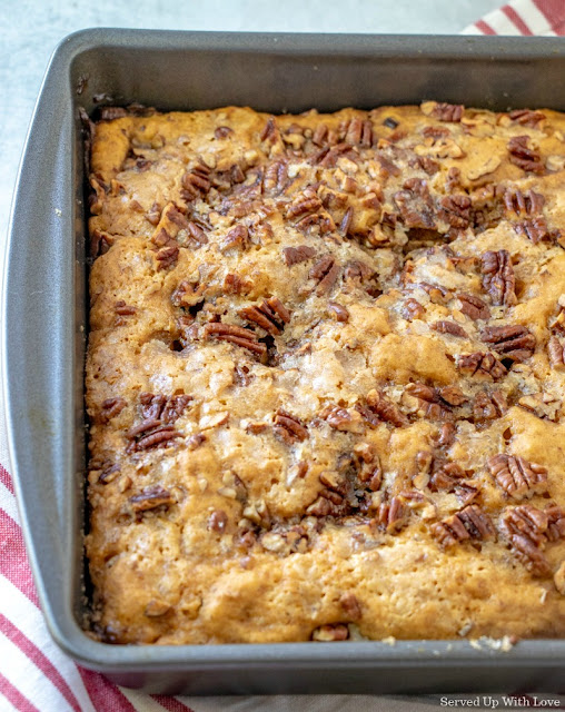 Pumpkin cobbler in a square baking pan fresh out of the oven